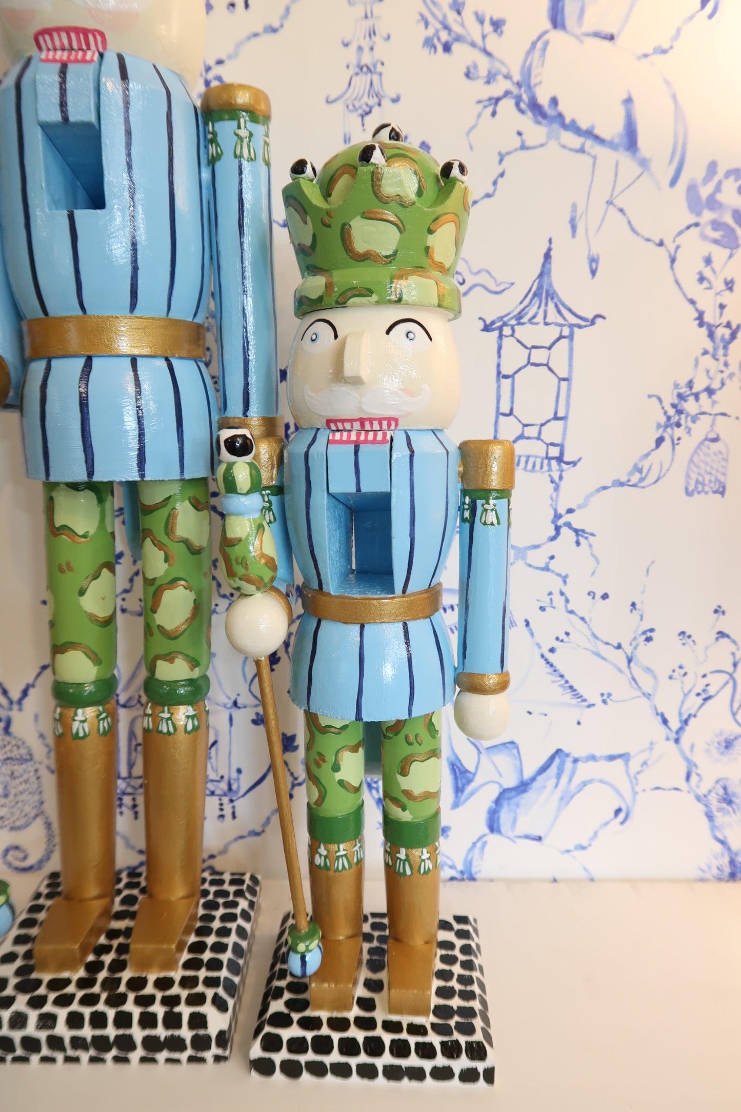 whimsical leopard blue crown nutcracker