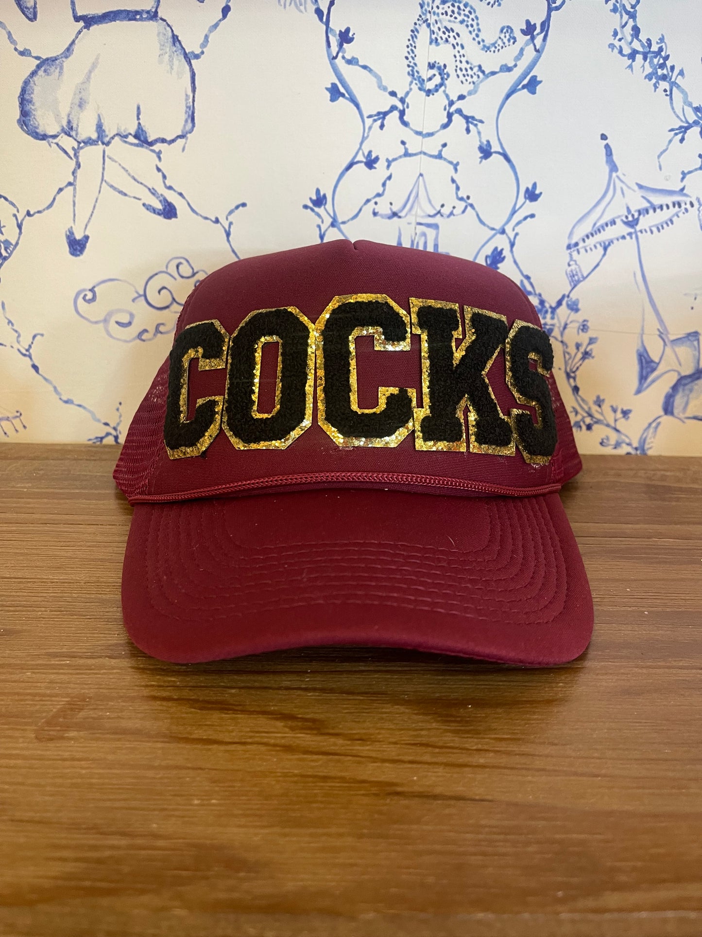 college trucker hat
